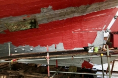 New hull plank being primed & painted